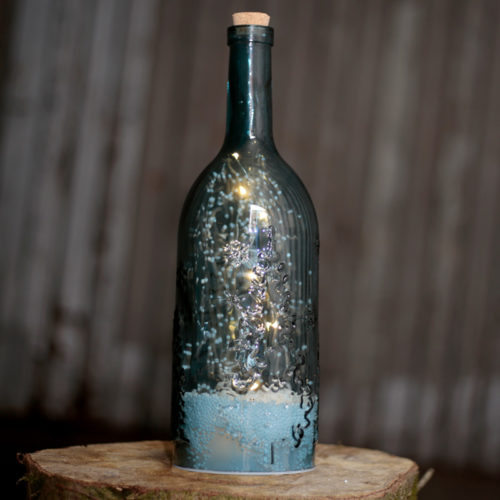 Musical LED Christmas Snowstorm - Blue Embossed Bottle Shaped